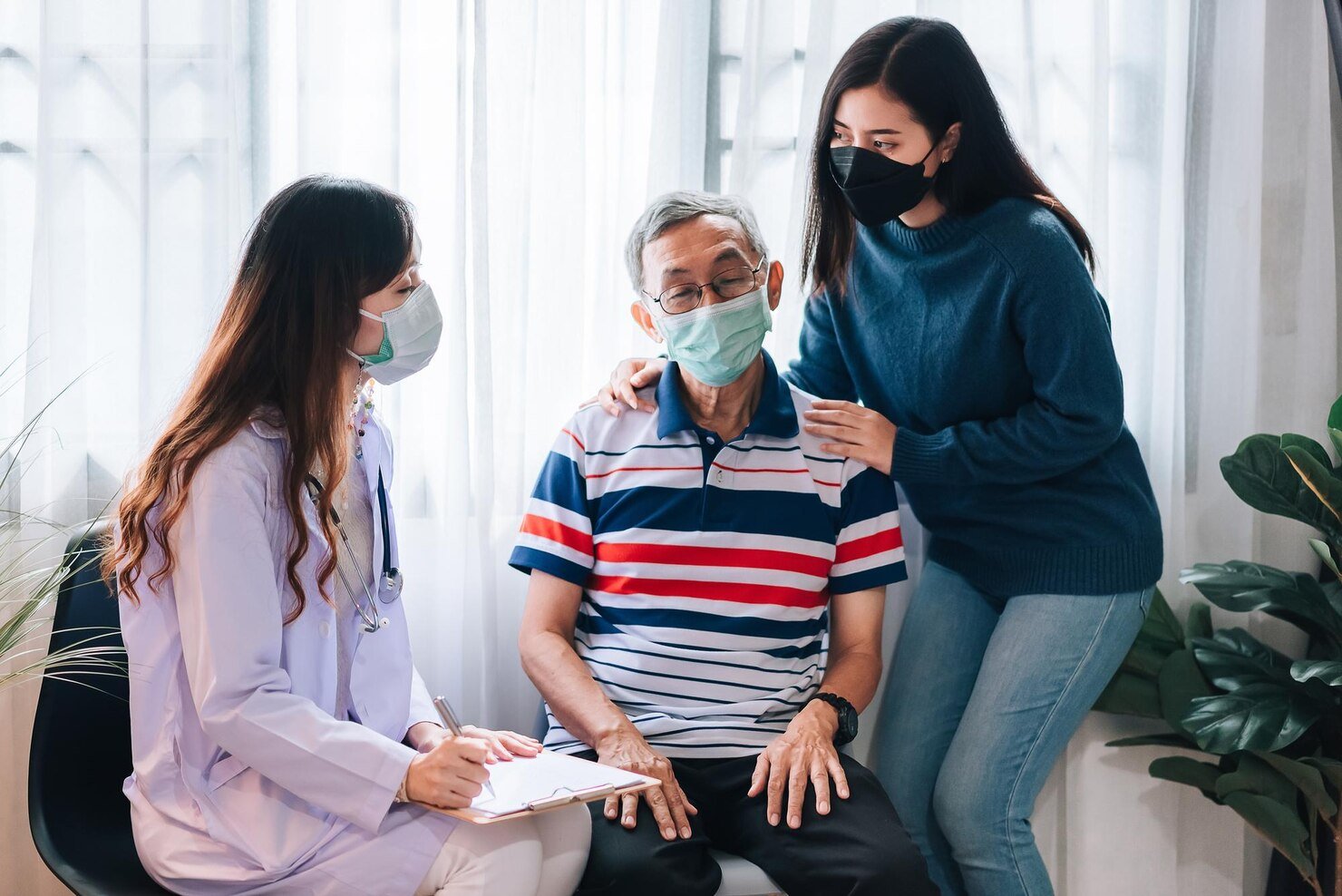 asian doctor visit examines senior man home doctor checking up consulting retirement health partienthospital services wearing mask protect covid19_640221 173